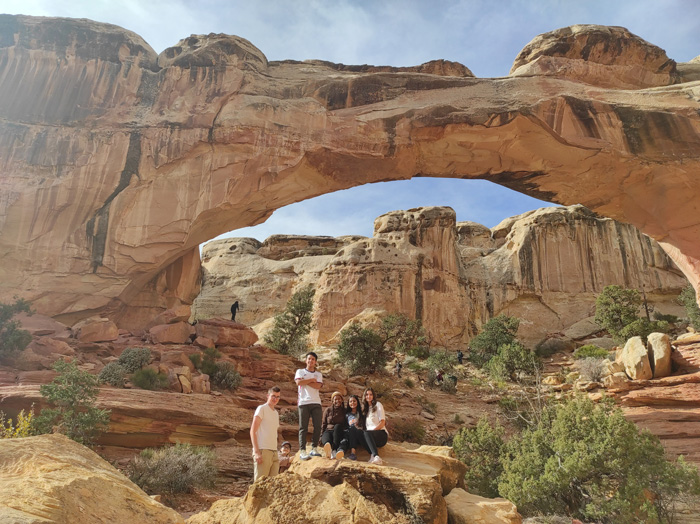 Students posing picture infront of Arches